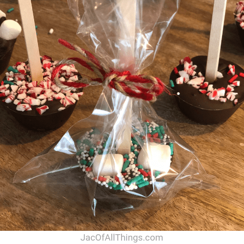 Place hot chocolate stick in a clear treat bag and decorate with a ribbon.