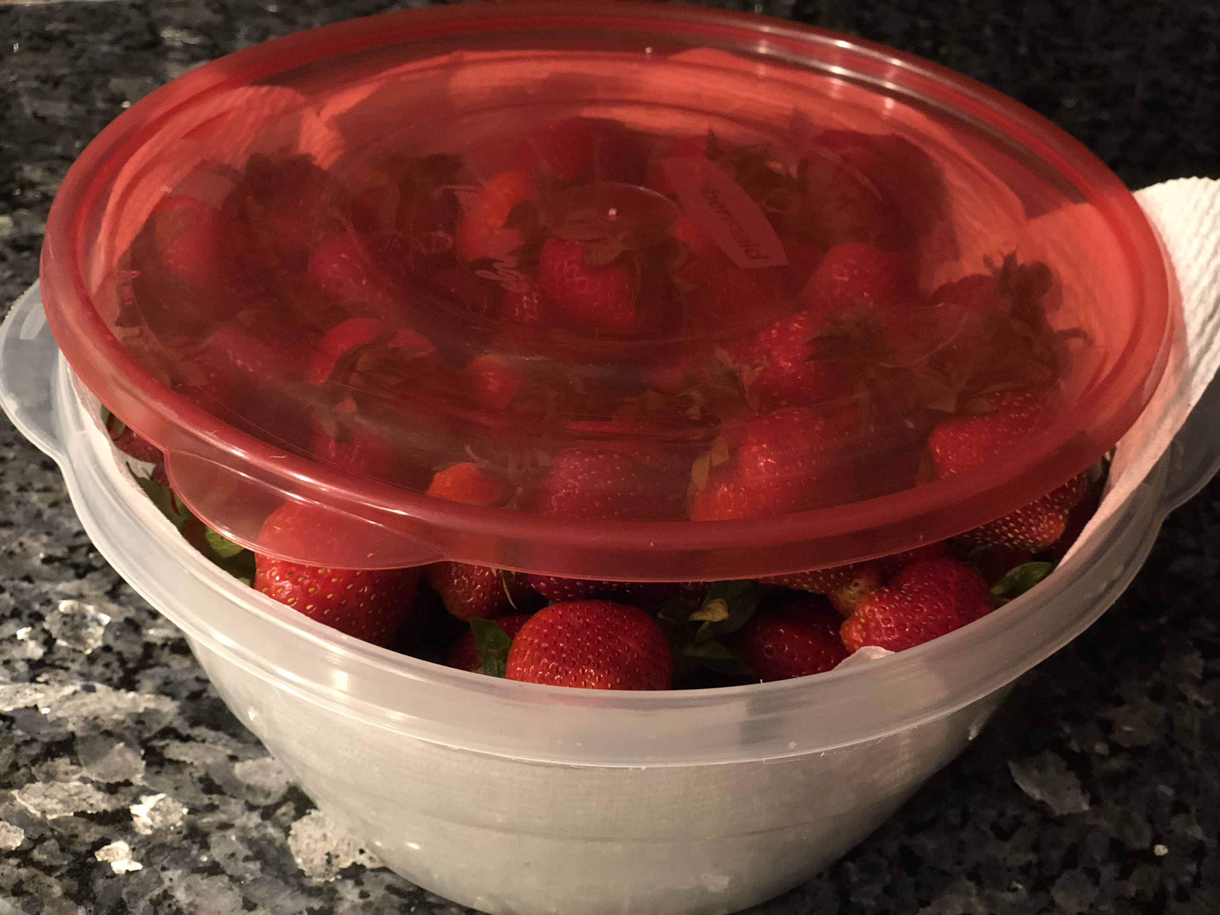 Cover bowl slightly to keep strawberries fresh