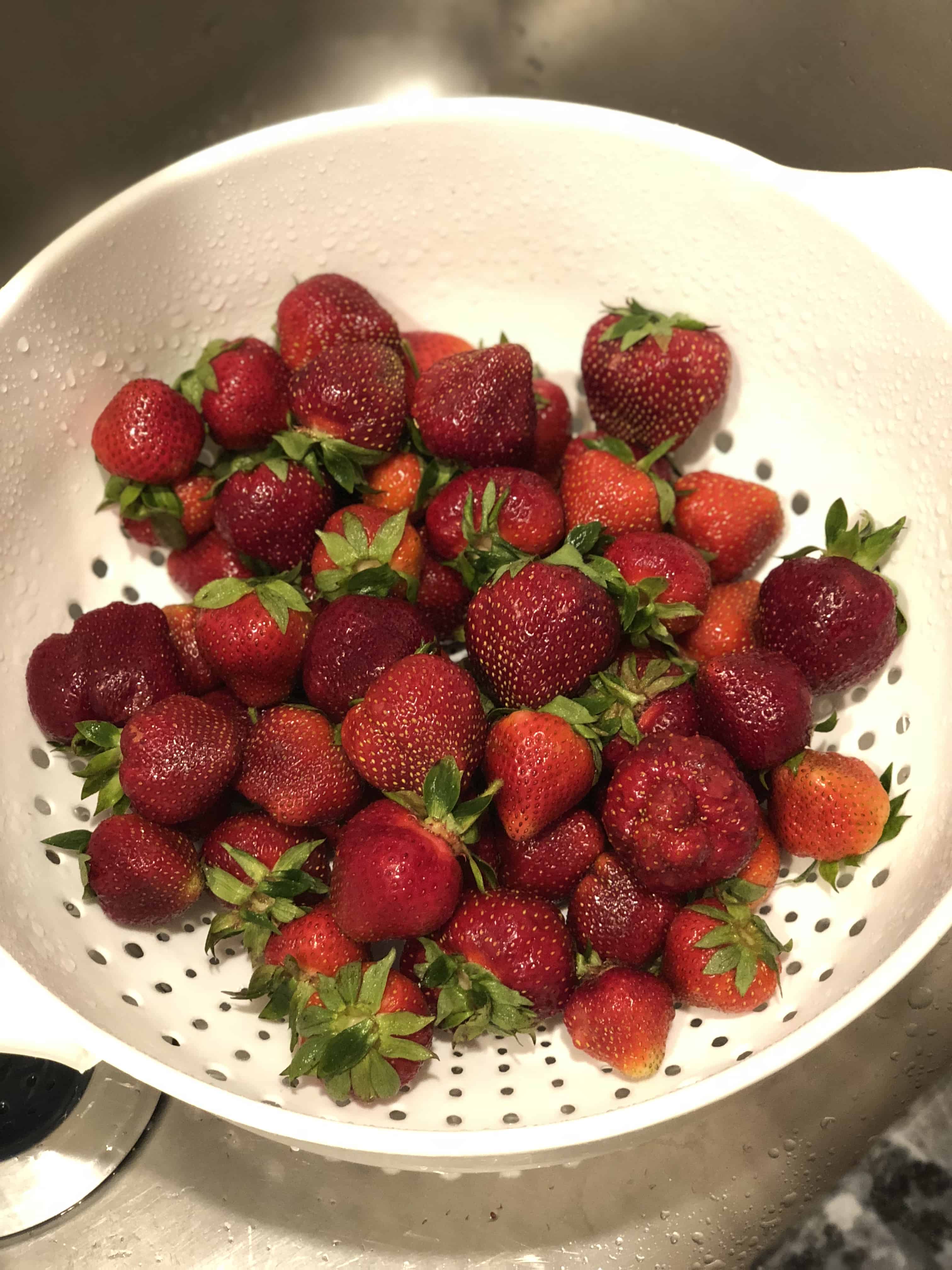Drain and rinse vinegar bath to keep strawberries fresh